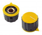 Gałka 15x21mm; średnica osi: 6,35mm; czarna; kolor dekielka: żółty